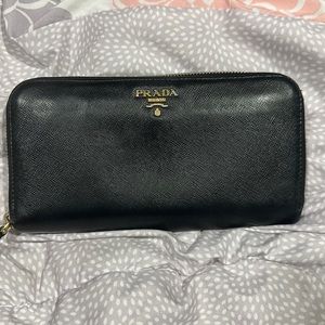 Prada large full zip leather wallet.